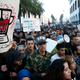 With graphic posters and signs some thousands of Moroccans protest against the death of Mouhcine Fikri last Friday, in the northern city of Hoceima in Rabat, Morocco,